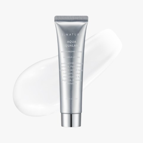 S.NATUR Aqua Squalane moisturizing cream tube with a white cream smear in the background.