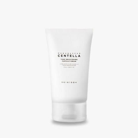 White squeeze tube of Centella Tone Brightening Capsule Cream by Skin1004, standing upright against a pale background.