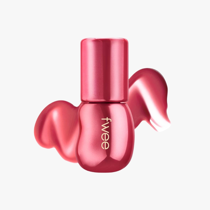 Pink nail polish bottle with metallic finish and swirling blobs of polish around it
