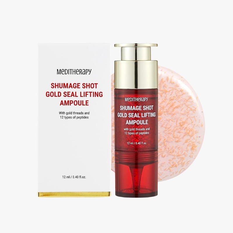 Meditherapy Shumage Shot Gold Seal Lifting Ampoule bottle beside its white box on a pale background; label includes 'SHUMAGE SHOT GOLD SEAL LIFTING AMPOULE' and mentions 'with gold threads and 12 types of peptides'.