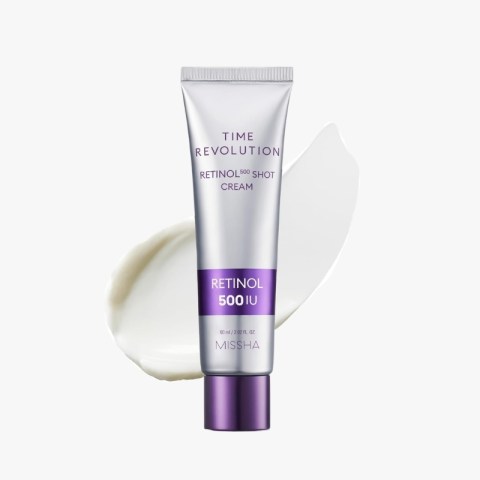Missha Time Revolution Retinol 500IU cream tube on a white background with a cream swatch behind it